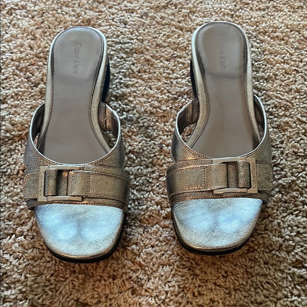 Calvin Klein Silver Mules with Modern Design